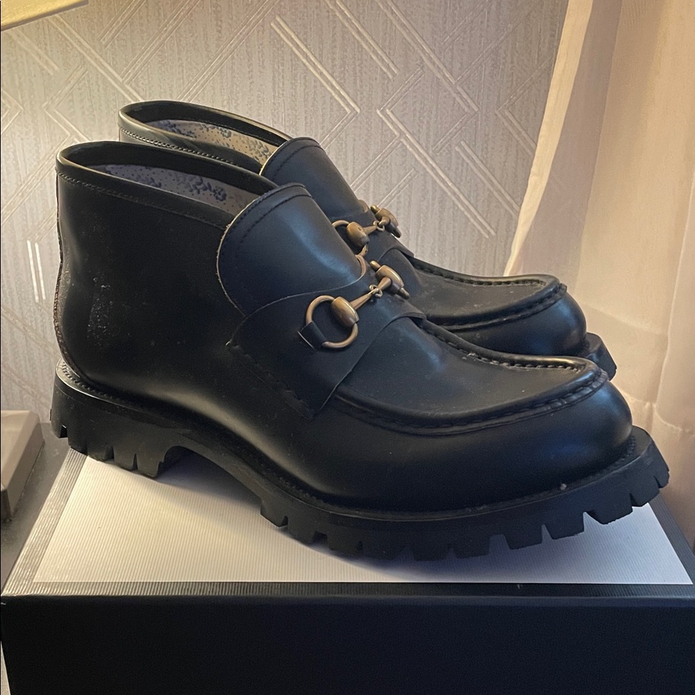Gucci Black Leather Boots with Gold Accent